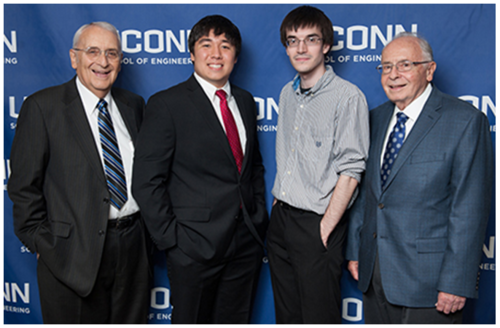 The Altschuler brothers with scholarship recipients.PNG